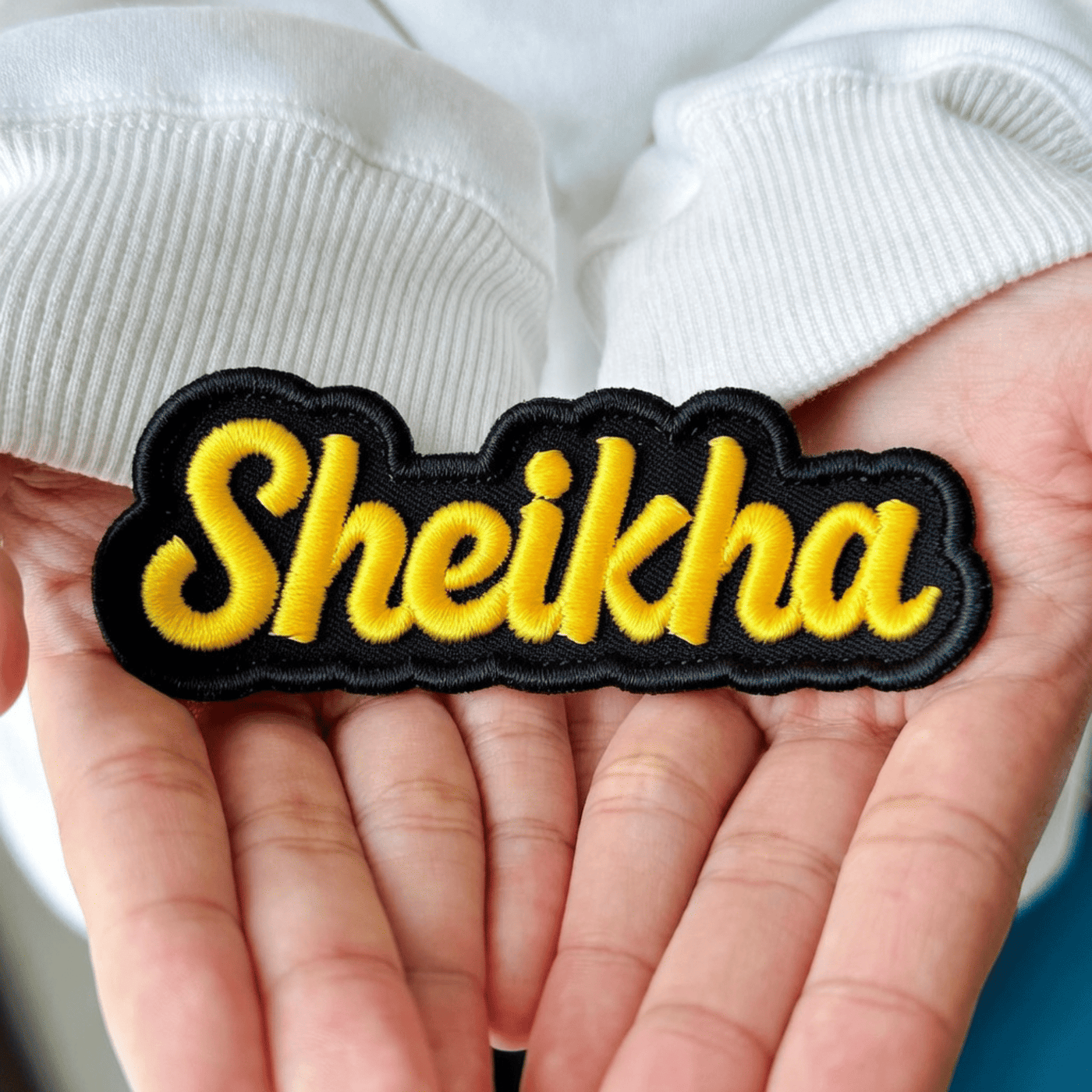 Custom patch applied to branded apparel