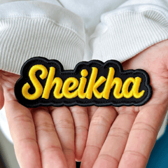 Custom patch applied to branded apparel